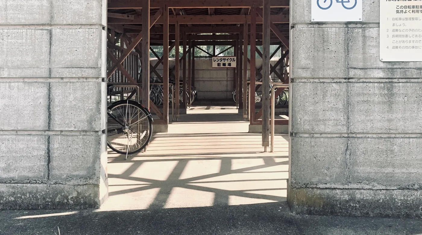 The concrete-block bicycle shed that once stood in front of Amaharashi Station (now demolished)