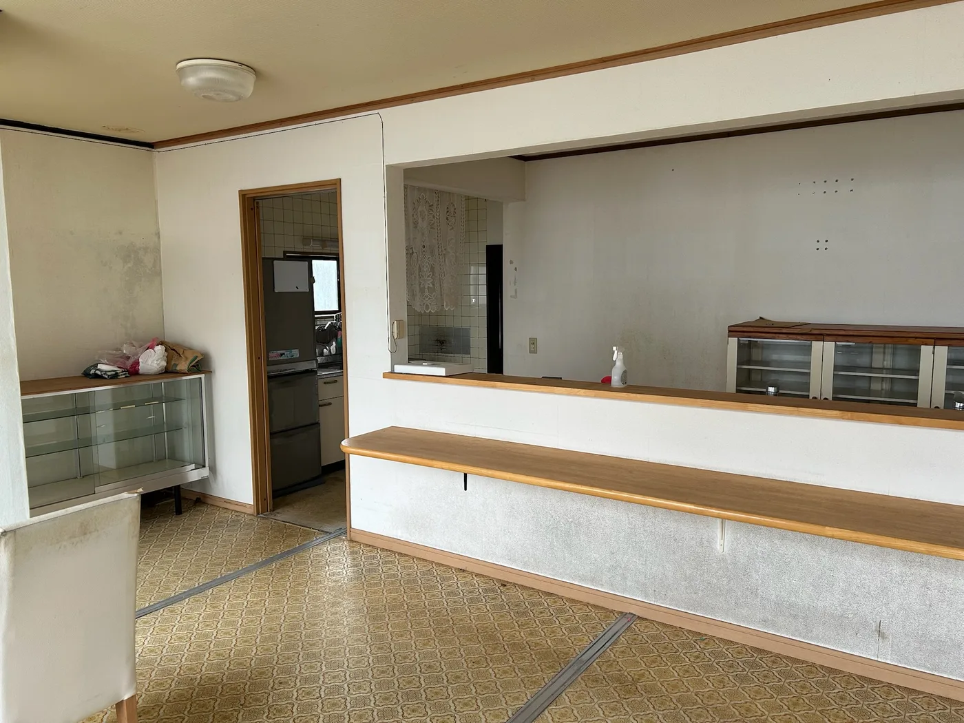 Inside the building when it was a diner, with the counter and kitchen still in place